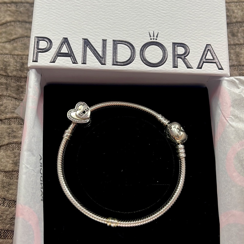 Authentic Pandora Beacelet with Mom charm. New in box
